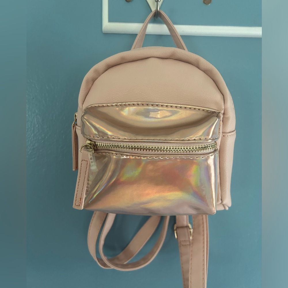 EUC Pink mini backpack with adjustable straps